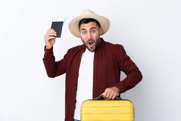 Joven Hombre Guapo Sobre Fondo Blanco Aislado Vacaciones Con Maleta — Foto de Stock