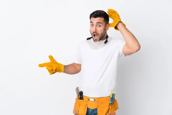 Craftsmen Electrician Man Isolated White Background Surprised Pointing Finger Side — Stock Photo, Image