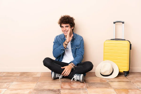 Traveler Man His Suitcase Sitting Floor Whispering Something — Stock Photo, Image
