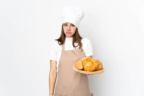 Jovem Mulher Uniforme Chef Isolado Fundo Branco Triste — Fotografia de Stock