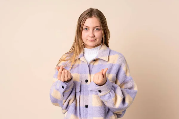 Teenager Ουκρανικό Κορίτσι Απομονώνονται Μπεζ Φόντο Κάνει Χειρονομία Χρήματα Αλλά — Φωτογραφία Αρχείου