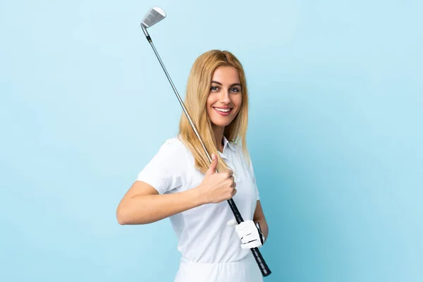 Mladá Uruguayská Blondýnka Přes Izolované Modré Pozadí Hraje Golf Palci — Stock fotografie