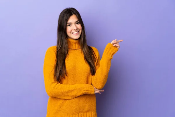 Teenager Brazilian Girl Isolated Purple Background Happy Pointing — Stock Photo, Image