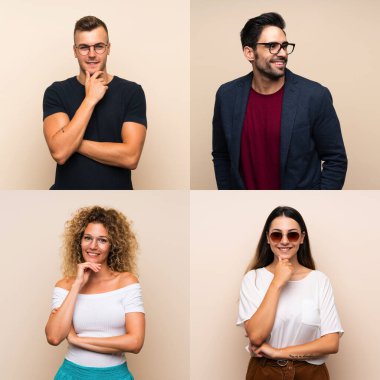 Gözlüklü ve gülümseyen bir grup izole edilmiş insan.