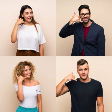 Bir grup insan izole edilmiş bir şekilde telefon jesti yapıyor. Bana geri dönüş işareti ver.