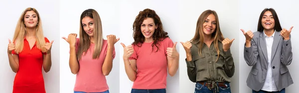 Ensemble Jeunes Femmes Sur Fond Blanc Avec Les Pouces Vers — Photo