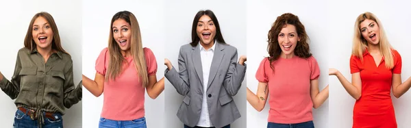 Conjunto Mulheres Jovens Sobre Fundo Branco Com Expressão Facial Chocada — Fotografia de Stock