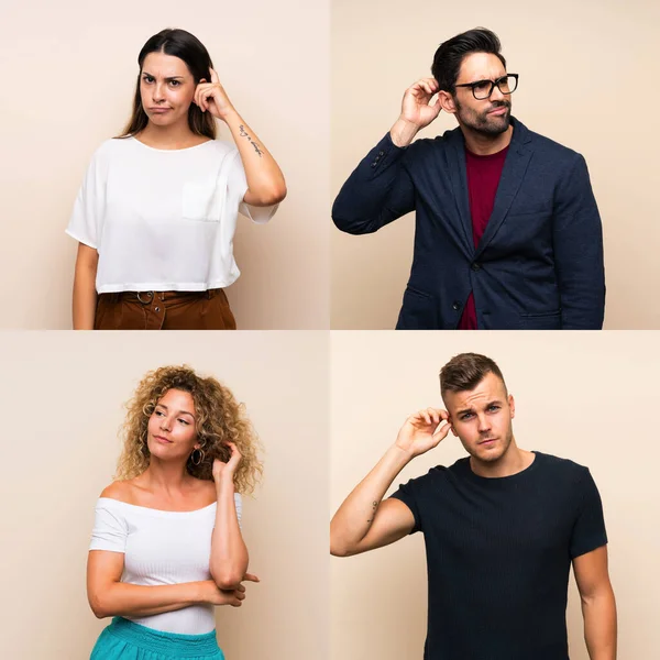 İzole edilmiş arka planda kuşkuları olan bir grup insan