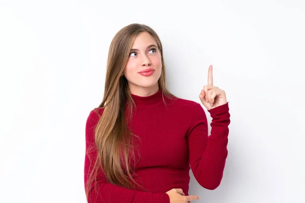 Tiener Blond Meisje Geïsoleerde Witte Achtergrond Wijzend Omhoog Verrast — Stockfoto