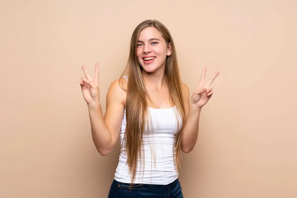 Teenager Blonde Girl Isolated Background Showing Victory Sign Both Hands — Stock Photo, Image