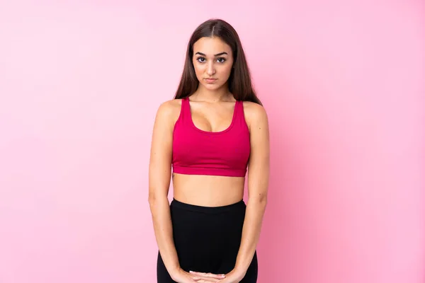 Ung Sport Flicka Över Isolerad Rosa Bakgrund Stretching Arm — Stockfoto