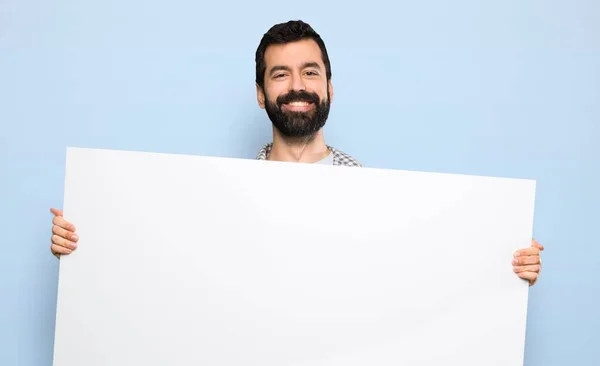 Happy Handsome Man Beard Holding Empty Placard Isolated Blue Background — 图库照片