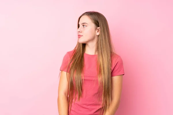 Teenager Blonde Girl Isolated Pink Background Looking Side — Stock Photo, Image