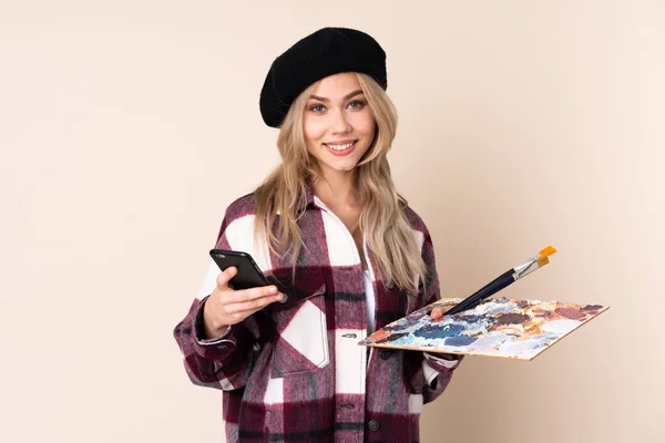 Teenager Artist Girl Holding Palette Isolated Blue Background Holding Coffee — Stock Photo, Image