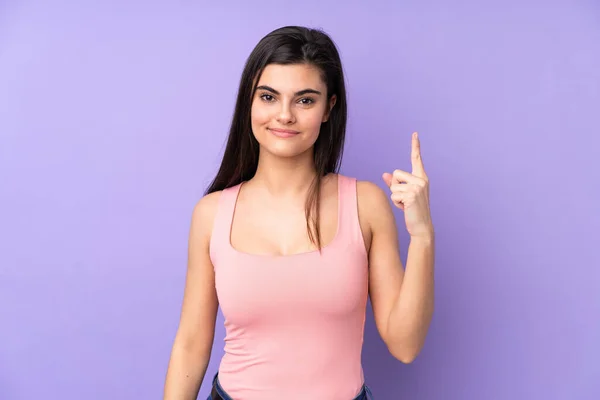 Junge Frau Über Isoliertem Lila Hintergrund Die Mit Dem Zeigefinger — Stockfoto