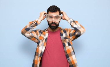 Craftsmen man over isolated blue background