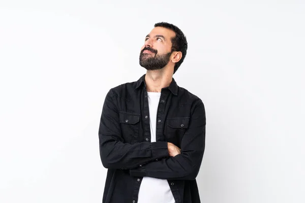 Jovem Com Barba Sobre Fundo Branco Isolado Olhando Para Cima — Fotografia de Stock