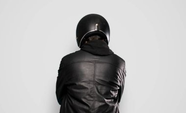 Biker man over isolated grey background