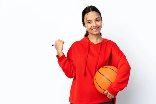 Young Woman Playing Basketball Isolated White Background Pointing Side Present — Stock Photo, Image