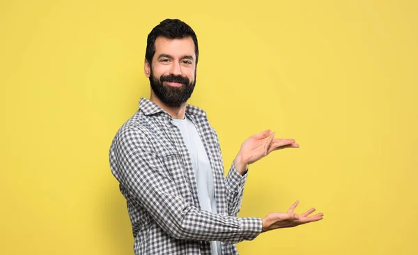 Handsome Man Beard Extending Hands Side Inviting Come — Stock Photo, Image