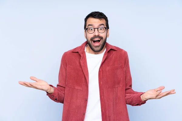 Jonge Blanke Man Draagt Corduroy Jas Blauwe Achtergrond Met Geschokte — Stockfoto