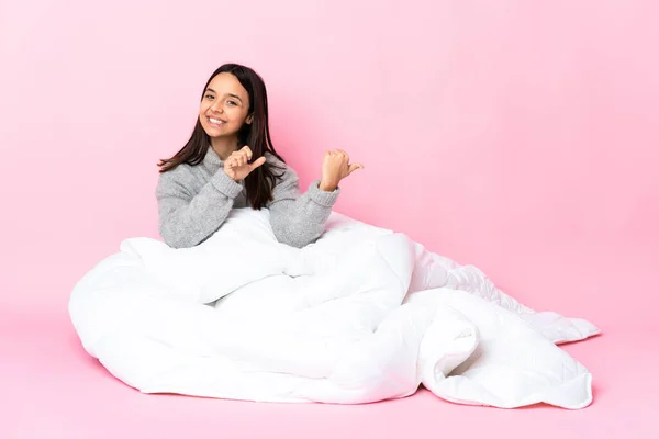 Young Mixed Race Woman Wearing Pijama Sitting Floor Pointing Side — Stock Photo, Image