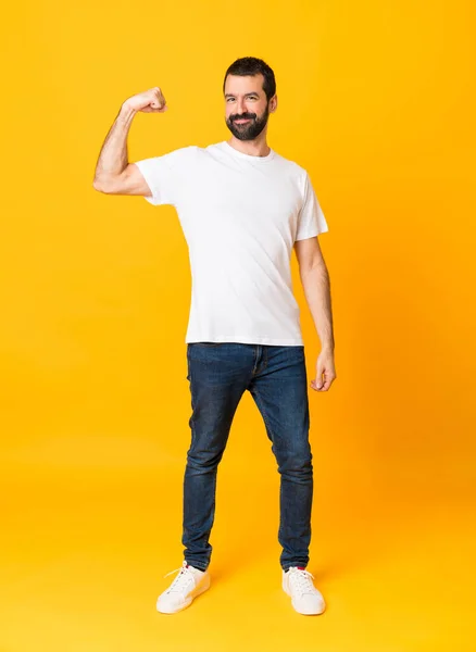 Full Length Shot Man Beard Isolated Yellow Background Doing Strong — Stock Photo, Image