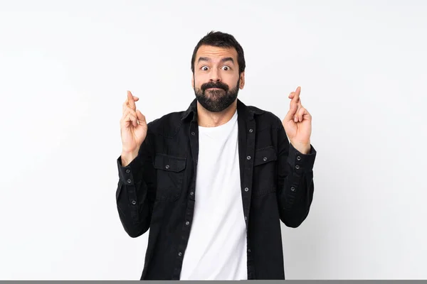 Jovem Com Barba Sobre Fundo Branco Isolado Com Dedos Cruzando — Fotografia de Stock