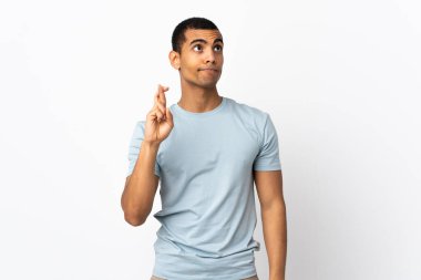 Afrika kökenli Amerikalı erkek, beyaz arka planda, şans diliyor ve en iyisini diliyor.