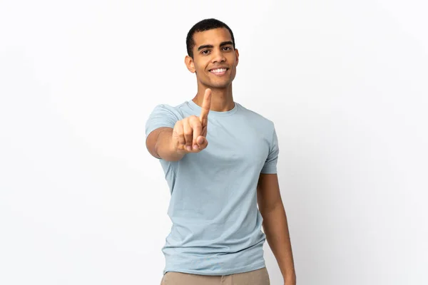 Afroamerikaner Vor Isoliertem Weißen Hintergrund Zeigt Und Hebt Einen Finger — Stockfoto