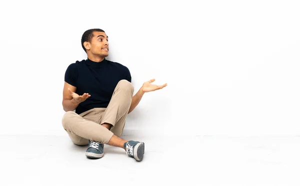 African American Man Sitting Floor Surprise Facial Expression — Stock Photo, Image