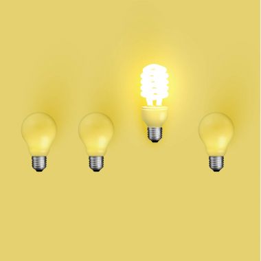 Energy saver lightbulb among old ones, vector illustration clipart