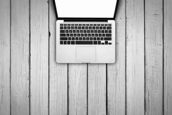 Laptop on old wooden desk — Stock Photo, Image