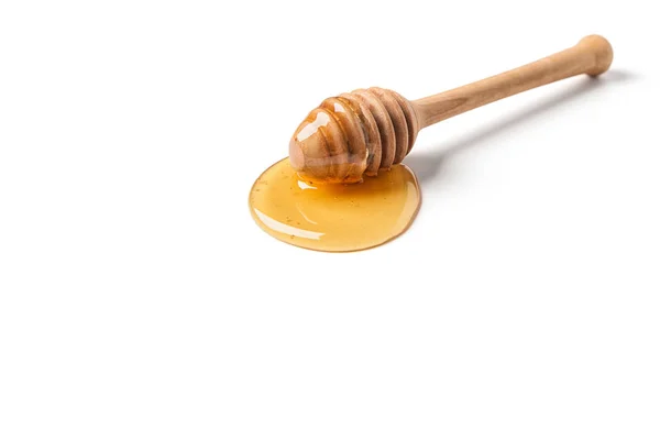 Honey dipper on white — Stock Photo, Image