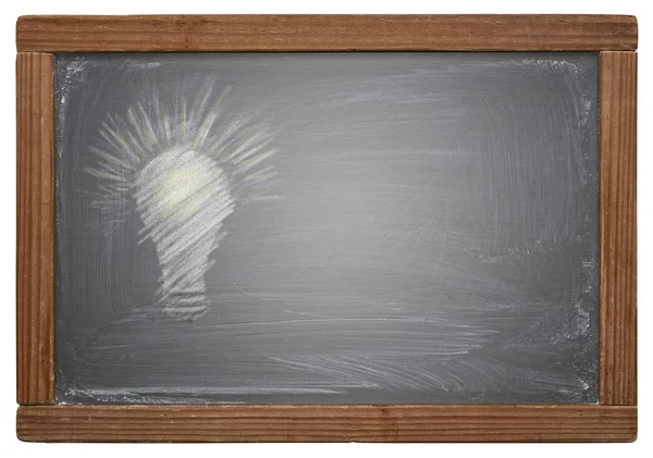 Gloeilamp op blackboard — Stockfoto