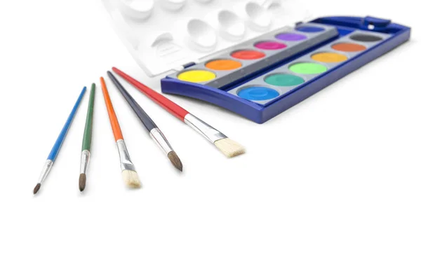 Palette of watercolor paints and brushes — Stock Photo, Image