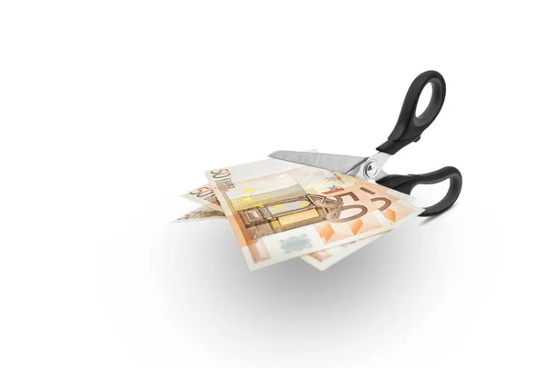 Scissors cutting money — Stock Photo, Image