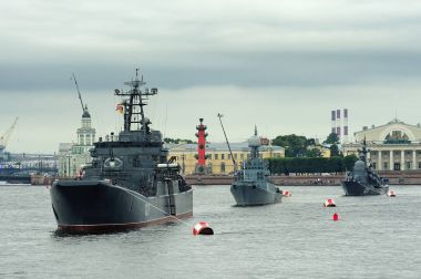  large landing craft Minsk, anti-submarine corvette Urengoi and  large missile boat Dimitrovgrad during a naval parade for  Navy Day clipart