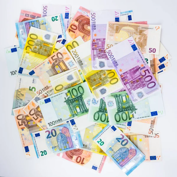 Concepto de financiación de billetes en euros efectivo sobre fondo blanco — Foto de Stock