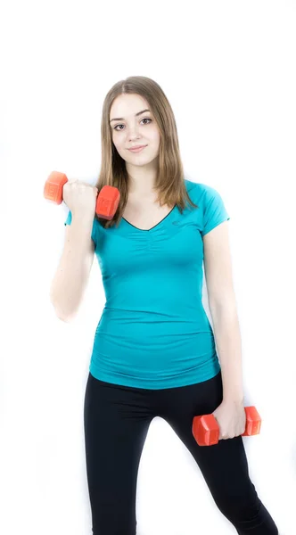 Chica con dumpbells en blanco fondo deporte concepto gimnasio — Foto de Stock