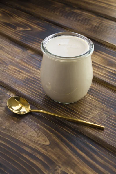 Homemade Ryazhenka Glass Jar Brown Wooden Background Fermented Milk Product — Stock Photo, Image