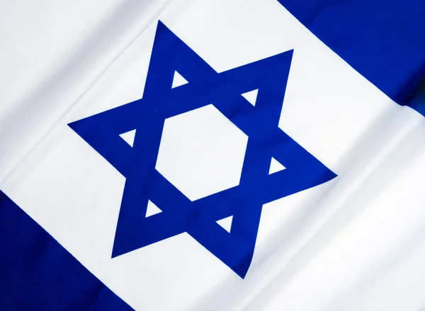 Israelische Flagge im Wind lizenzfreie Stockfotos