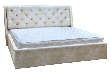 Frame double bed with artificial leather and spring mattress. clipart