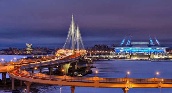Night city motorway, cable-stayed bridge and the football stadium. — Stock Photo, Image