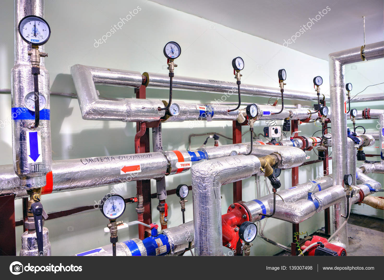 Hot Water And Heating System In Basement Of Apartment House Stock Hot Water And Heating System In Basement Of Apartment House Stock Photo