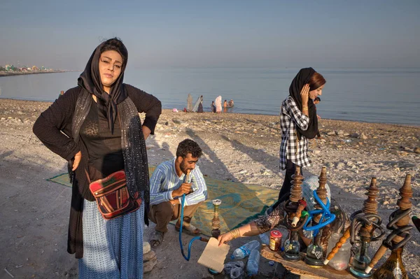 Portrait of persian woman on beach, next to hookah, Iran. — Stock Photo, Image