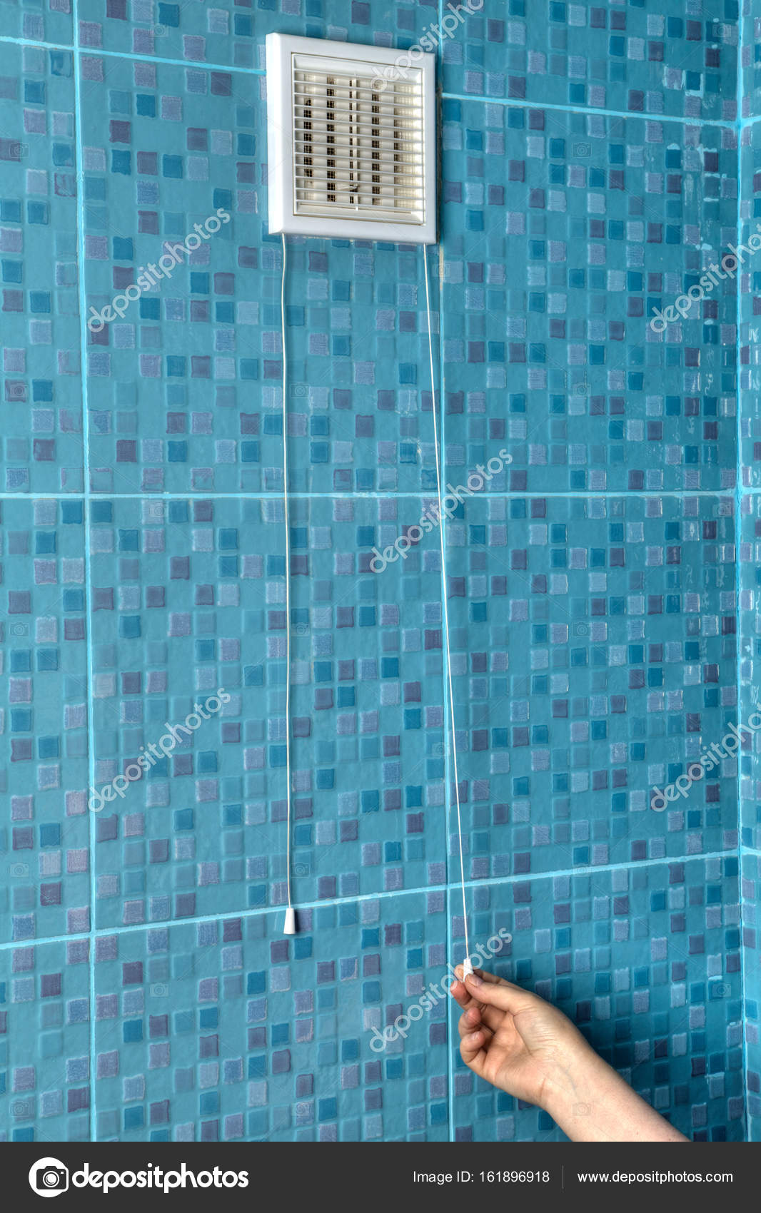White Air Vent Grille Plastic Cover On Wall In Bathroom Stock Air Ventilation Grill Cover With Cord Regulator Hand Closes The Shutter Using A Photo By Grigvovan