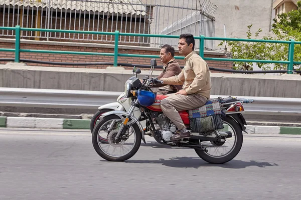 Two motorcycles are moving along highway in parallel, Tehran, Iran. — Stock Photo, Image