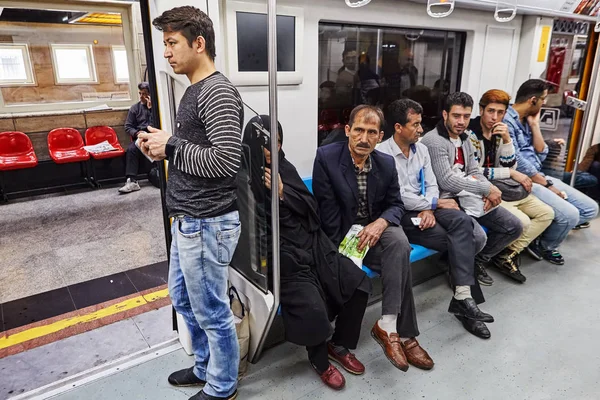 Passengers are sitting inside the subway train, Tehran, Iran. — Stock Photo, Image