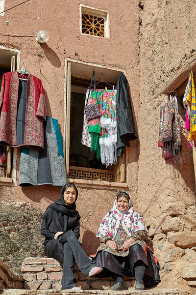 Two Iranian women in mountain village, Abyaneh, Iran.